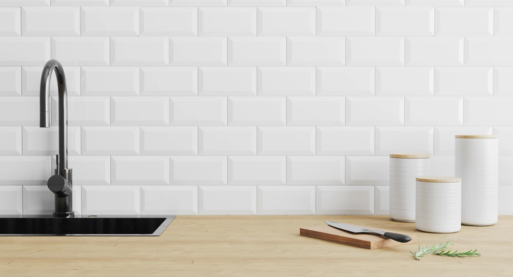Modern kitchen countertop with undermount sink, black faucet and white subway tile backsplash as part of Kitchen Installation